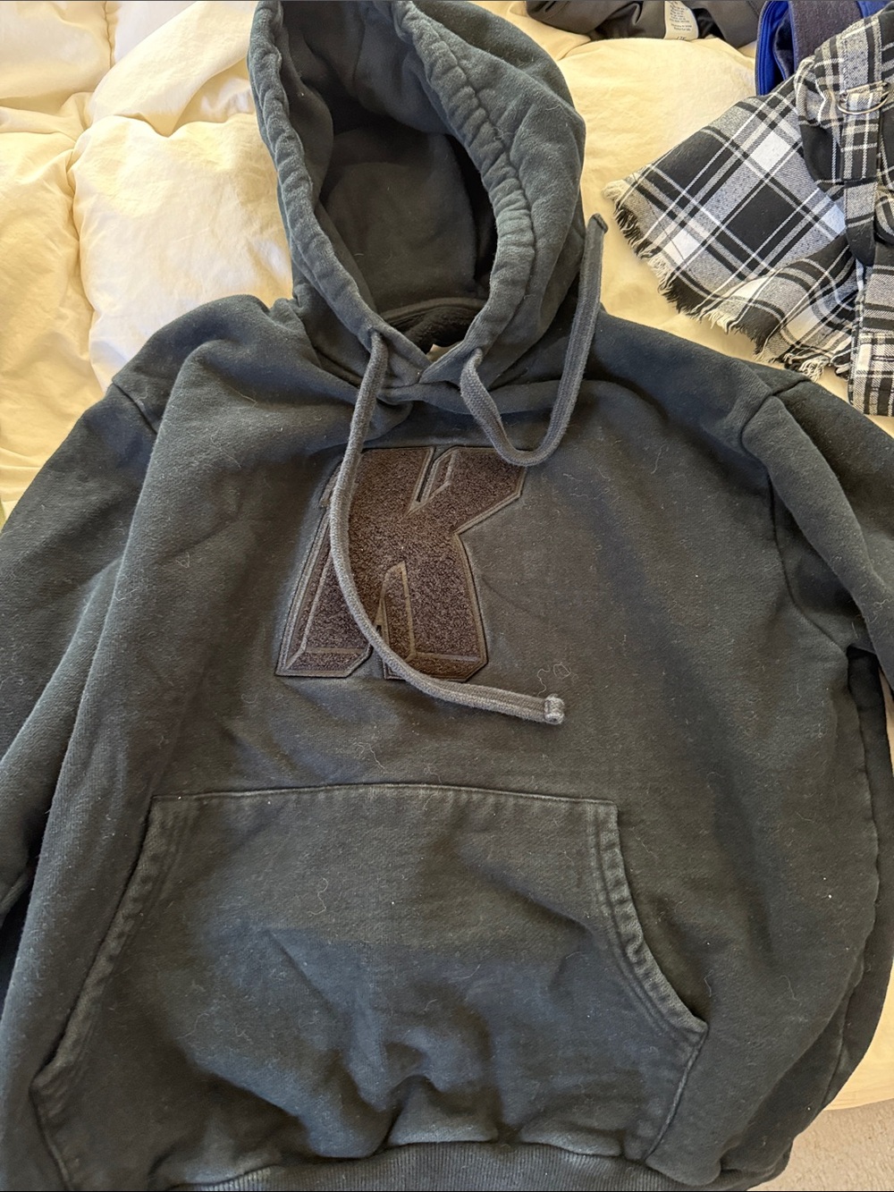 Kith Black Hoodie with Embroidered K Patch